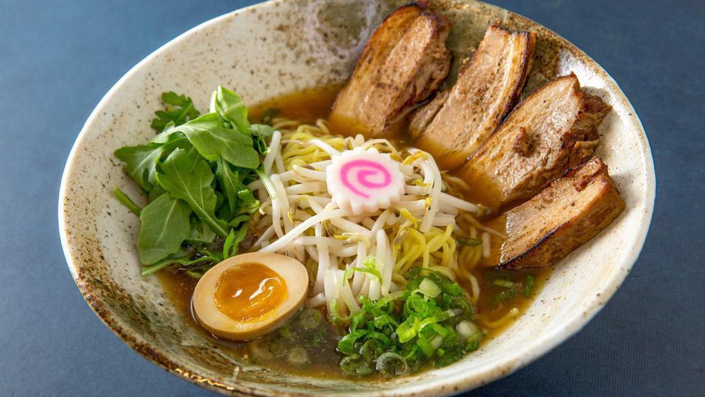 Shoyu Ramen · Pork or chicken chashu with marinated egg, bok choy, scallions, and bean sprouts.