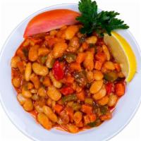 Fasulye Pilakisi · White kidney beans cooked with scallions, fresh tomatoes, garlic, and herbs.