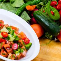 Shepherd Salad · Fresh tomatoes, cucumbers, onions, parsley, and homemade dressing
