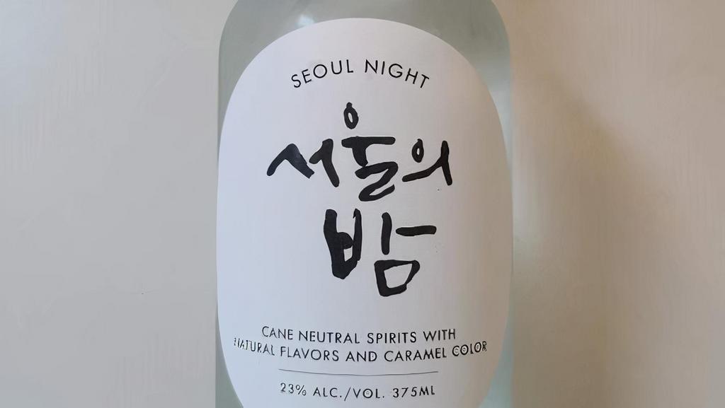 Seoul Night, Plum Soju · ABV 23% plum liqueur crafted with golden ripened maesil that heightens floral aromatics with notes of juniper berries