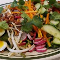 Thai Cobb · soft boiled egg, bacon, spiced peanuts, asian herbs, cucumbers, radish, carrots, and house m...