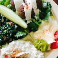 Falafel Salad · Salad with fried balls made from beans.