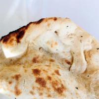 Naan · A traditional soft Indian white flour bread.