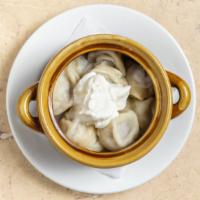 Siberian Pelmeni · Meat Dumplings served with choice of Russian Mustard or Sour Cream.