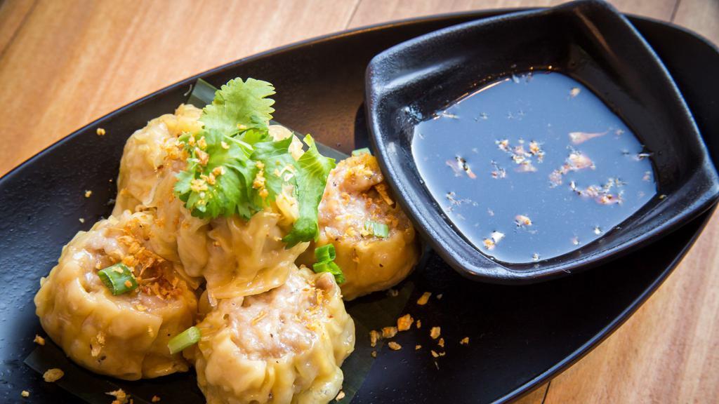 Dumpling · Steamed dumpling with chicken shrimp.