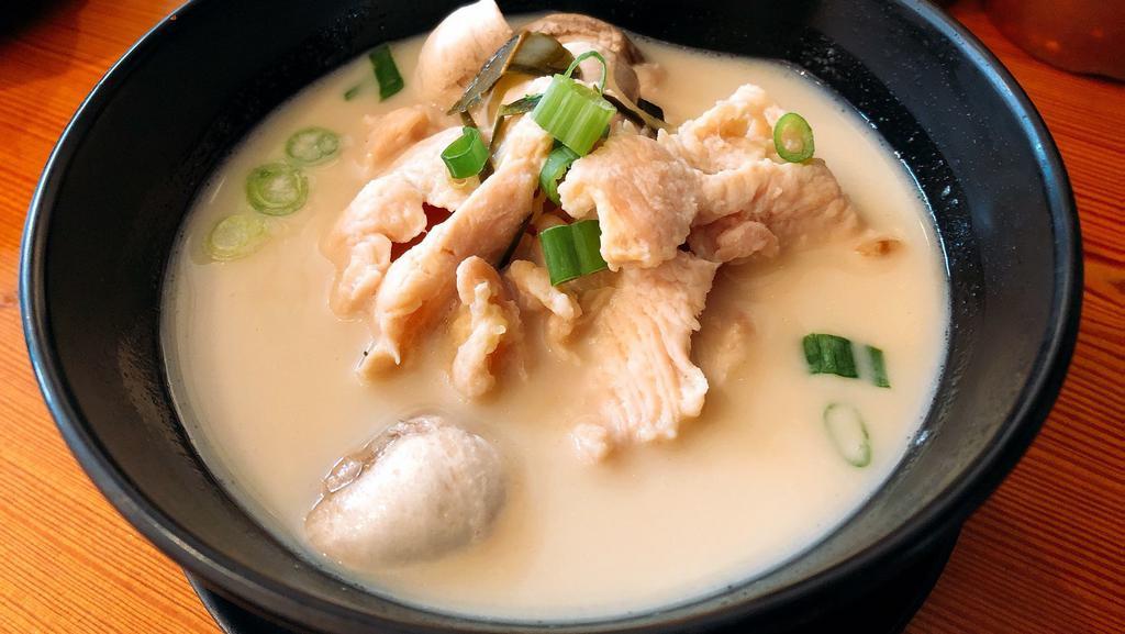 Tom Kha Soup · Mushroom, coconut milk, galangal, lemon grass and cilantro.