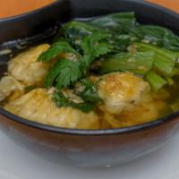 Wonton Soup · Chicken and shrimp wonton with vegetable broth and baby bok choy.