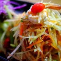 Seafood Papaya Salad · No peanut. Shrimp, squid, mussels, green papaya, carrot, tomato, string bean and spicy lime ...