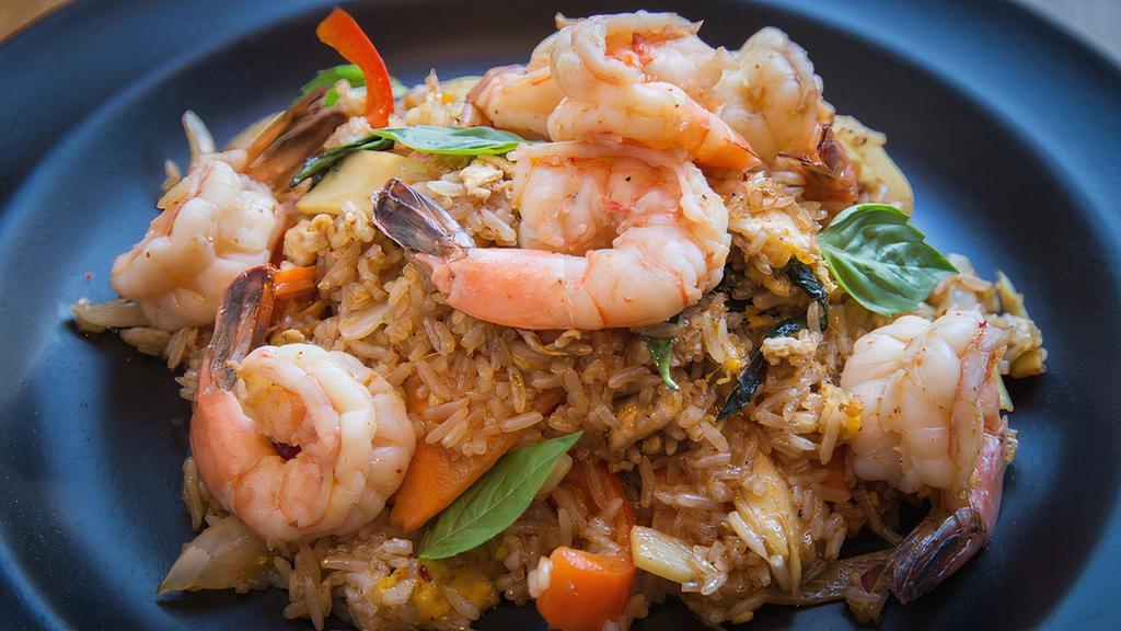 Spicy Basil Fried Rice · Spicy. Jasmine rice, egg, chili, garlic, bell peppers, bamboo shoots, carrot, bell pepper and basil.
