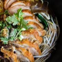 Roasted Duck Noodle Soup · Egg noodle, crispy roasted duck, Chinese broccoli, bean sprout, cilantro with Thai special c...
