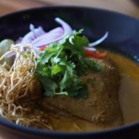 Khao Soy Noodle · Egg noodle, grilled chicken thigh, coconut milk, turmeric, bean sprout, 
red onion, cilantro...