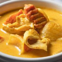 Yellow Curry · Yellow curry paste blended with coconut milk, carrot, onion, potatoes, bell pepper.