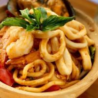 Seafood Basil Udon Noodle · Udon noodles, shrimp, squid, mussels, egg, basil, bell pepper, onion, served with secret spi...
