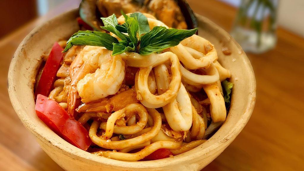 Seafood Basil Udon Noodle · Udon noodles, shrimp, squid, mussels, egg, basil, bell pepper, onion, served with secret spicy sauce.