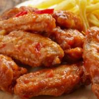 Shack'S Sweet N Chili Wings · Oven baked and crisp bone-in chicken wings smothered in sweet n chili sauce.