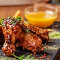 Shack'S Honey Mustard Wings · Oven baked and crisp bone-in chicken wings smothered in sweet honey mustard sauce.