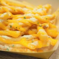 Cheese Fries · Golden crispy fries salted and fried to perfection and topped with melted cheese.