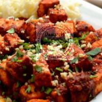 Paneer 555 · Deep-fried paneer cooked in special sauce with cashew nuts.