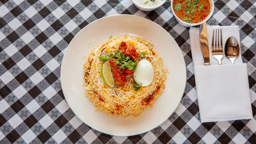 Bawarchi Boneless Chicken Biryani (Family Pack) · Curried boneless chicken and eggs cooked in basmati rice with special herbs and spices.