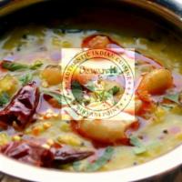 Dal Tadka · Yellow lentils tempered with garlic onions, tomatoes and spices.