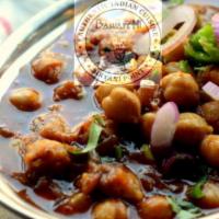 Channa Masala · Garbanza beans cooked with tomatoes.