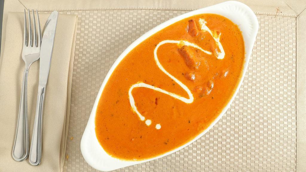 Butter Chicken · Chicken cooked with spices, herbs and rich buttery sauce.