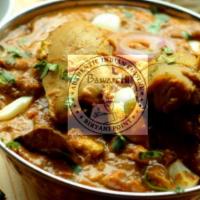 Chicken Mughalai · Pieces of chicken in a delicious creamy gravy with egg and coriander.