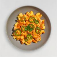Double Buffalo Mac · Add a little spice to your life! Classic creamy mac and cheese with buffalo chicken and hot ...