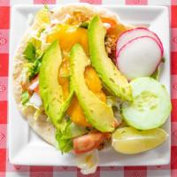 Tex Mex Pollo Taco · Chicken flour tortilla, lettuce, tomatoes, sour cream, and mixed shredded cheese and a piece...