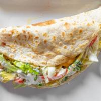 Tex Mex Quesadilla Chicken · Flour tortilla with chicken, yellow cheddar mixed cheese topped with avocado, tomatoes, lett...