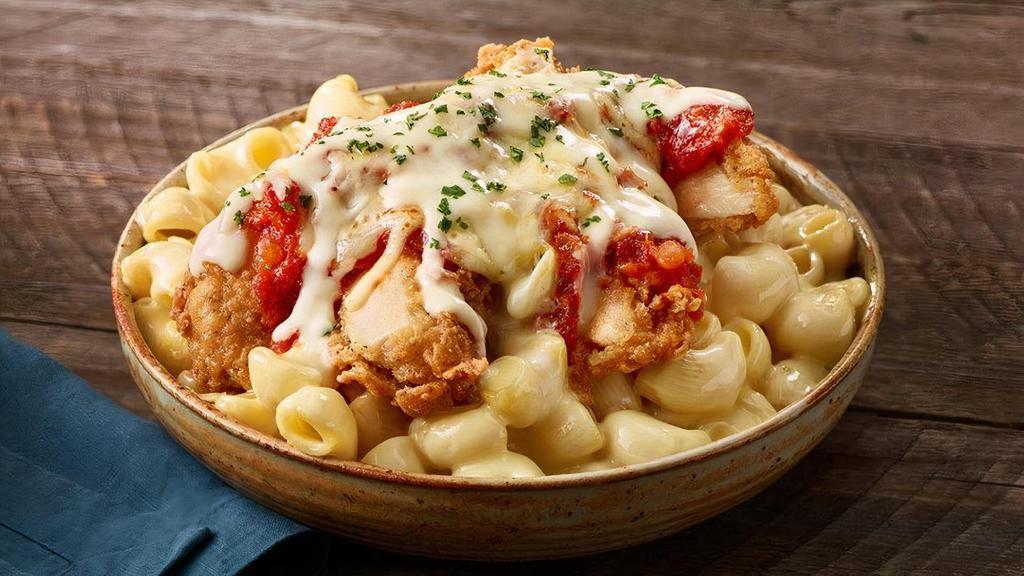  Parmesan Chicken Mac ‘N Cheese · Crispy chicken breast topped with marinara sauce, melted mozzarella and Parmesan cheeses. Served atop our signature mac 'n cheese.