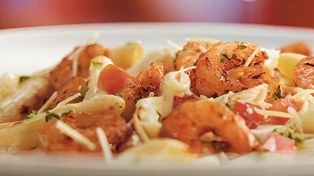 Parmesan Shrimp Pasta  · Spicy sautéed shrimp over penne in Parmesan cream with tomatoes.  Served with 4 Breadsticks.