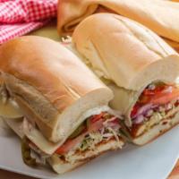 Herb Lemon Chicken, Provolone, Lt, Onion, And Roasted Peppers Hero Sandwich · Delicious Hero Sandwich made with Herb lemon seasoned chicken, Provolone cheese, lettuce, to...