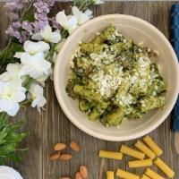 Vegan Tuscan Pesto Pasta · Beyond Sausage, Gluten-Free Pasta, Kale Pesto and Organic Broccoli.