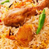 Chicken Biryani · A World-Renowned Fragrant Rice Casserole, Biryani takes time and practice to make but is wor...