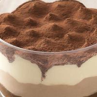 Tiramisu · The Ultimate Italian Goodness of Baked Ladyfingers Dipped in Coffee, Layered with a Whipped ...