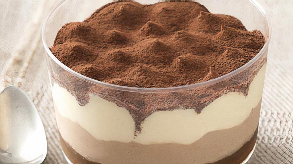 Tiramisu · The Ultimate Italian Goodness of Baked Ladyfingers Dipped in Coffee, Layered with a Whipped Mixture of
Eggs, Sugar and Mascarpone Cheese, Flavored with Cocoa.
