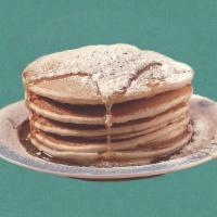 Classic Pannies · 3 fluffy pancakes served with maple syrup, butter, and dusted with powdered sugar.
