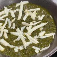 Palak Paneer · Homemade cubed cottage cheese in a fresh creamed spinach.