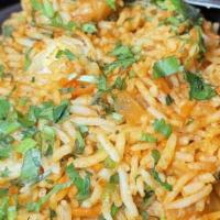 Shrimp Biryani · Shrimp & Basmati Rice Cooked With Fresh Herbs & Spices Served With Raita.