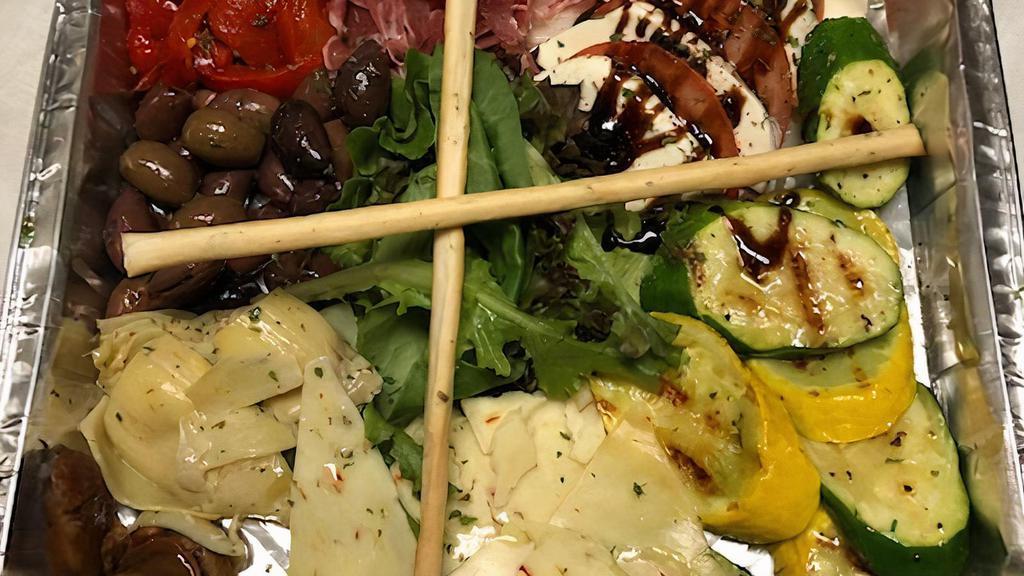 Mediterranean Cold Plate · Prosciutto chorizo, cheese, olives, artichokes, roasted red peppers, grilled vegetables tomatoes and mozzarella.