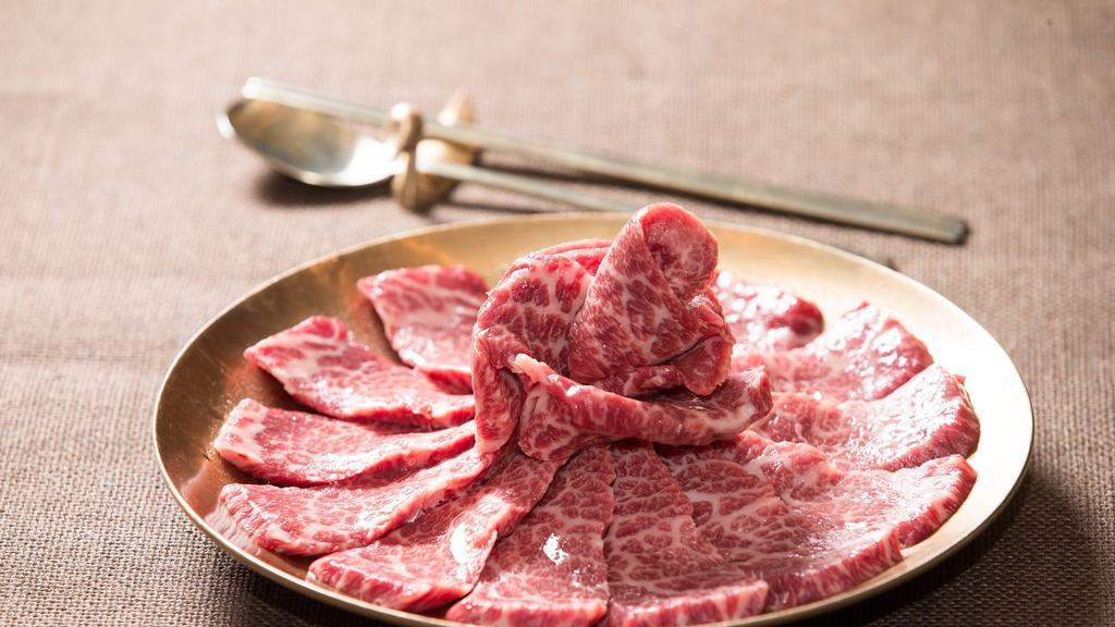 Prime Kkotsal 꽃살 · USDA certified prime boneless meat (10 oz.) wet aged, two weeks highly marbled and tender.