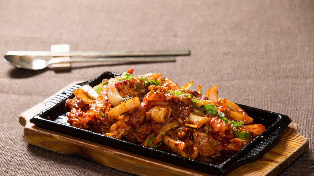 Ohsam-Bokkeum 오삼볶음 · Stir fried pork belly and squid with vegetables in spicy sauce.