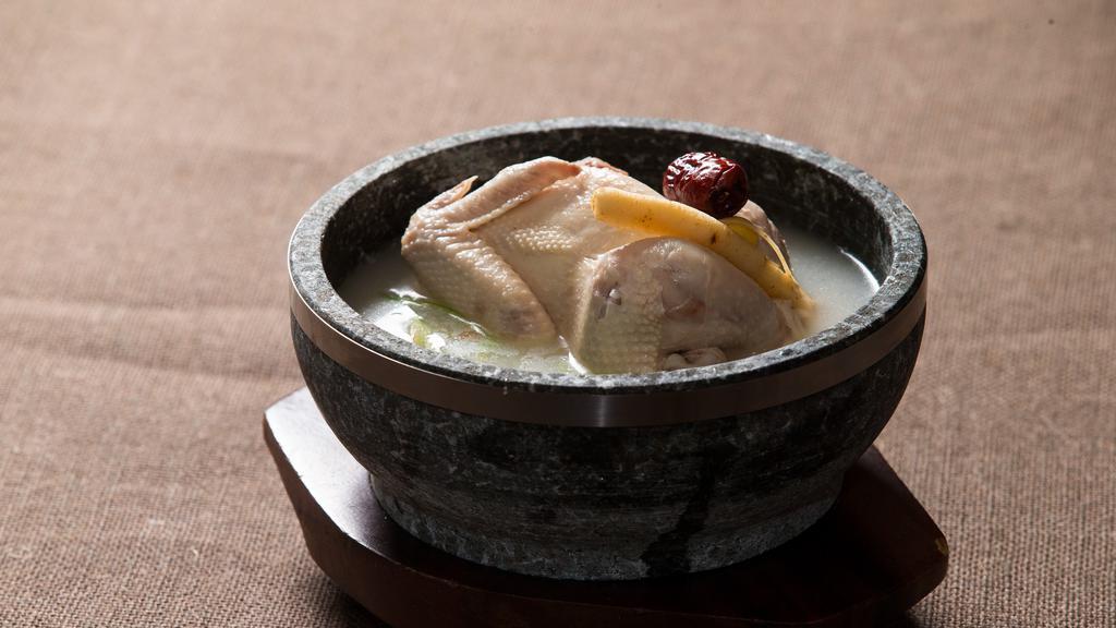 Hanbang Samgyetang 삼계탕 · Premium ginseng chicken soup with medicinal herbs.
