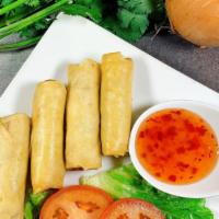 Spring Rolls · Cabbage, carrot, glass noodles, black peppers and Thai seasoning. Served with Thai sweet chi...