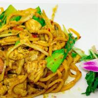 Singapore Noodles · Stir fried Lo mein noodle (egg noodle) with yellow curry sauce, cabbage, carrots and bok-choi.