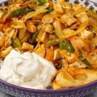 Chicken Perogies · Pan-seared Potato and Cheddar Perogies, sauteed chicken, onions, and green peppers.  Tossed ...