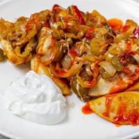 Hot Hot Hot Perogies · Pan-seared Potato and Cheddar  Perogies, tossed with Hot Peppers, sauteed onions, sauteed pe...