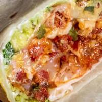 Breakfast Burrito With Egg, Cheese, & Sausage · Fresh eggs with creamy cheese and savory sausage wrapped in a homemade tortilla served with ...