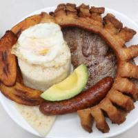 Bandeja Paisa · Most popular. Paisa platter. Meat, rice, egg, sausage, avocado, beans and pork rinds.